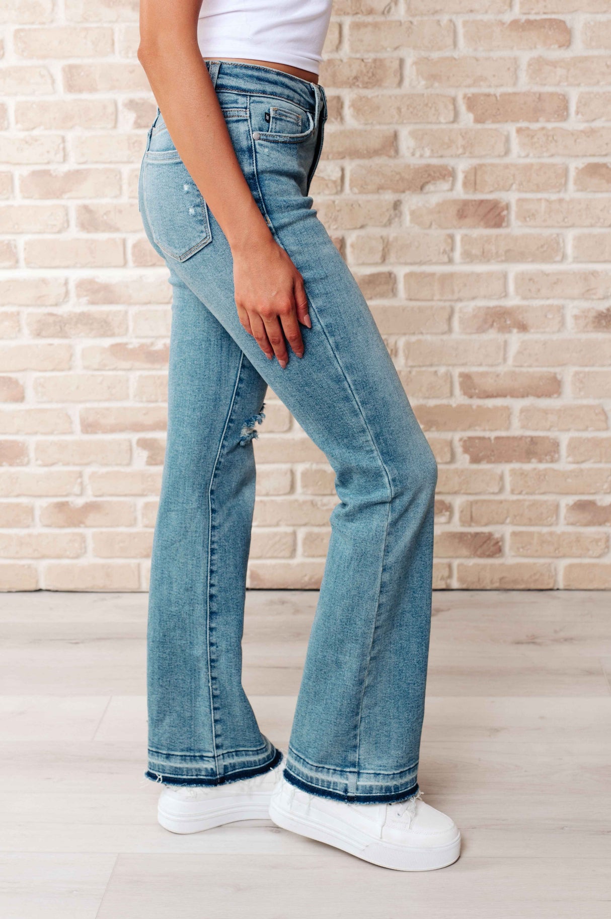 Isla Mid Rise Distressed Released Hem Bootcut Jeans - Liarian Unlimited Boutique