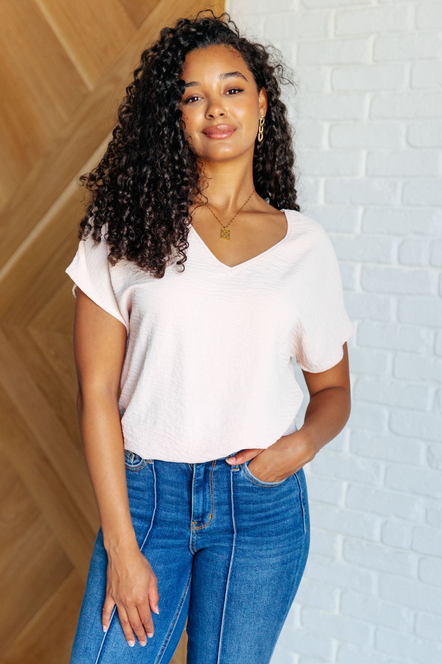 Preguntas frecuentes sobre el top con cuello en V en color rubor