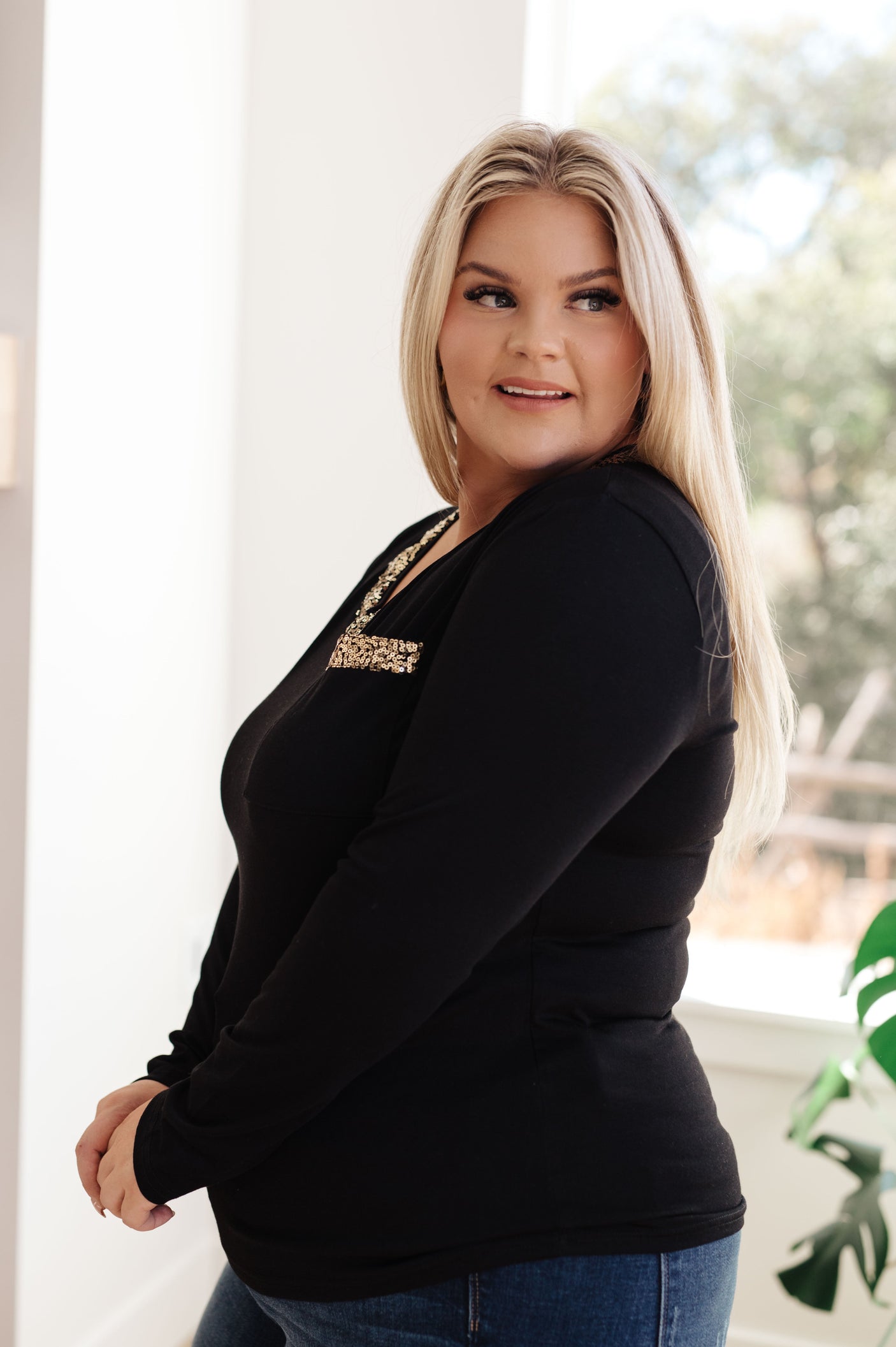 Top de manga larga con cuello en V y forro brillante