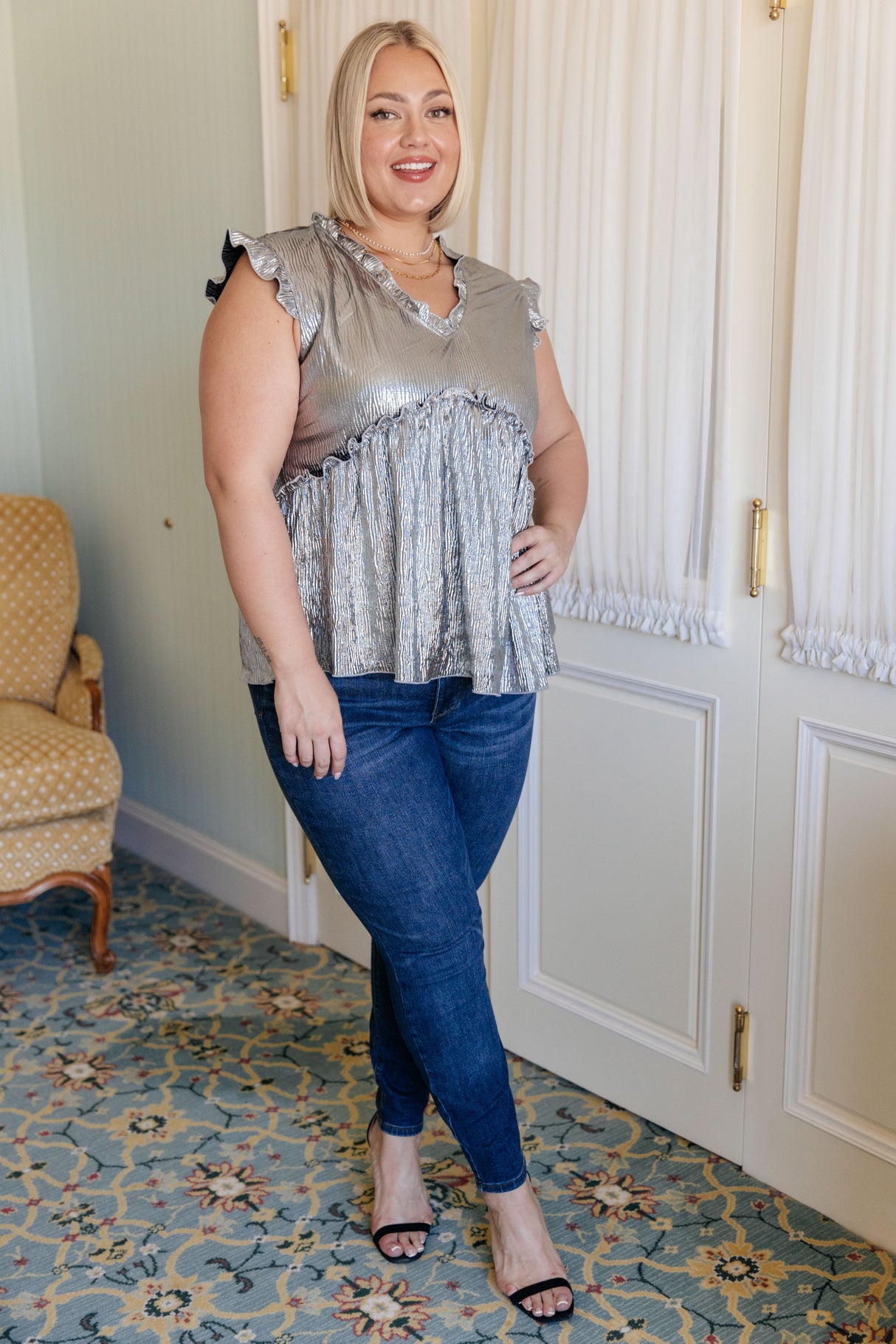 Top peplum metalizado brillante