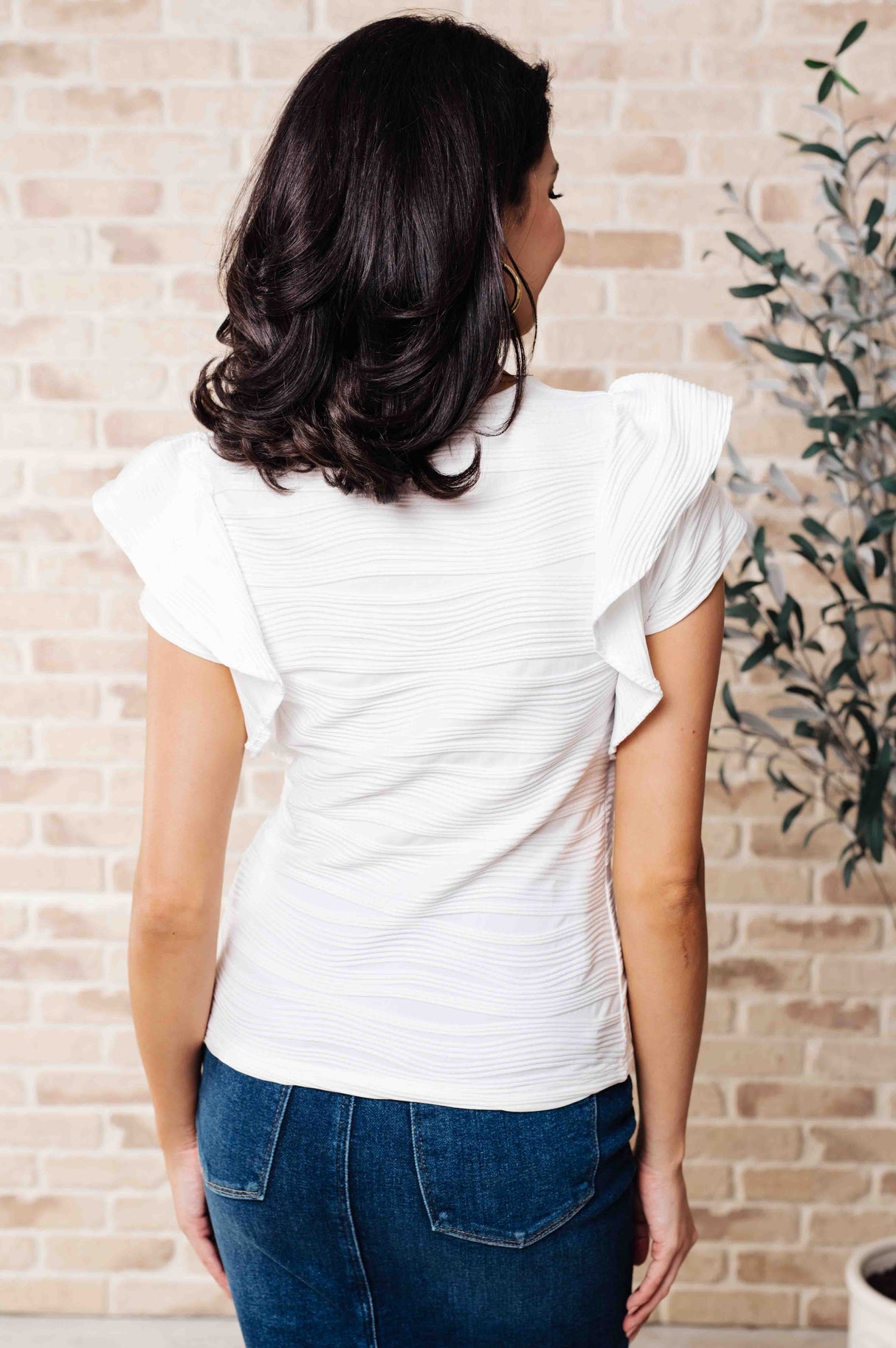 Blusa con mangas con volantes de Highest Praise
