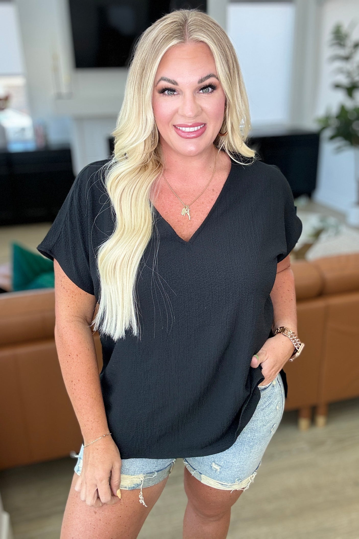 Top de cuello en V "Let Me Be Your Wings" en negro