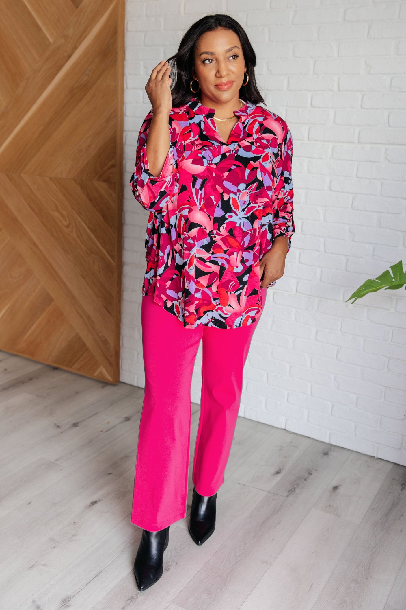 Top Lizzy con estampado floral negro y magenta