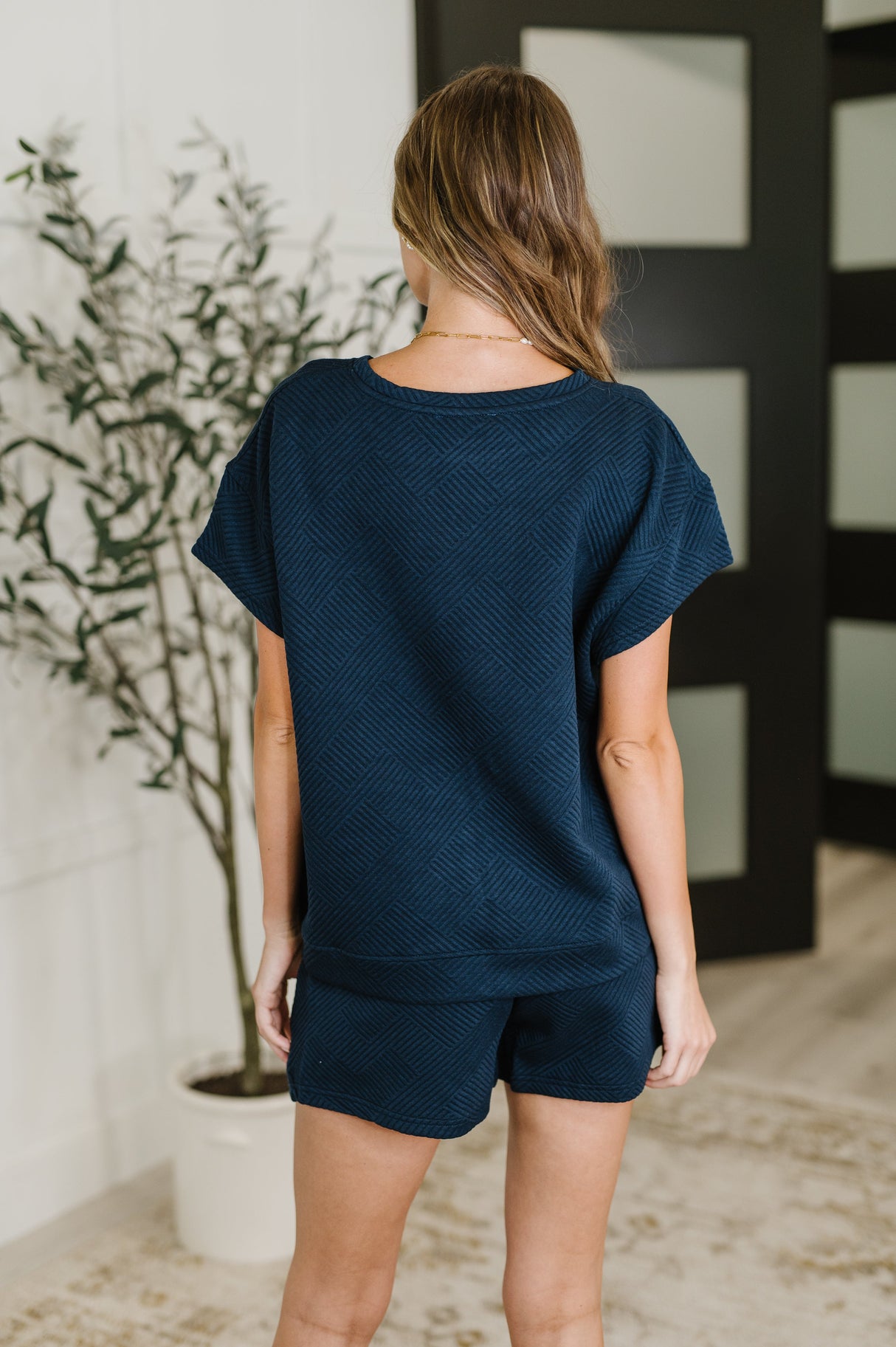 Top acolchado Love on the Loose en azul marino