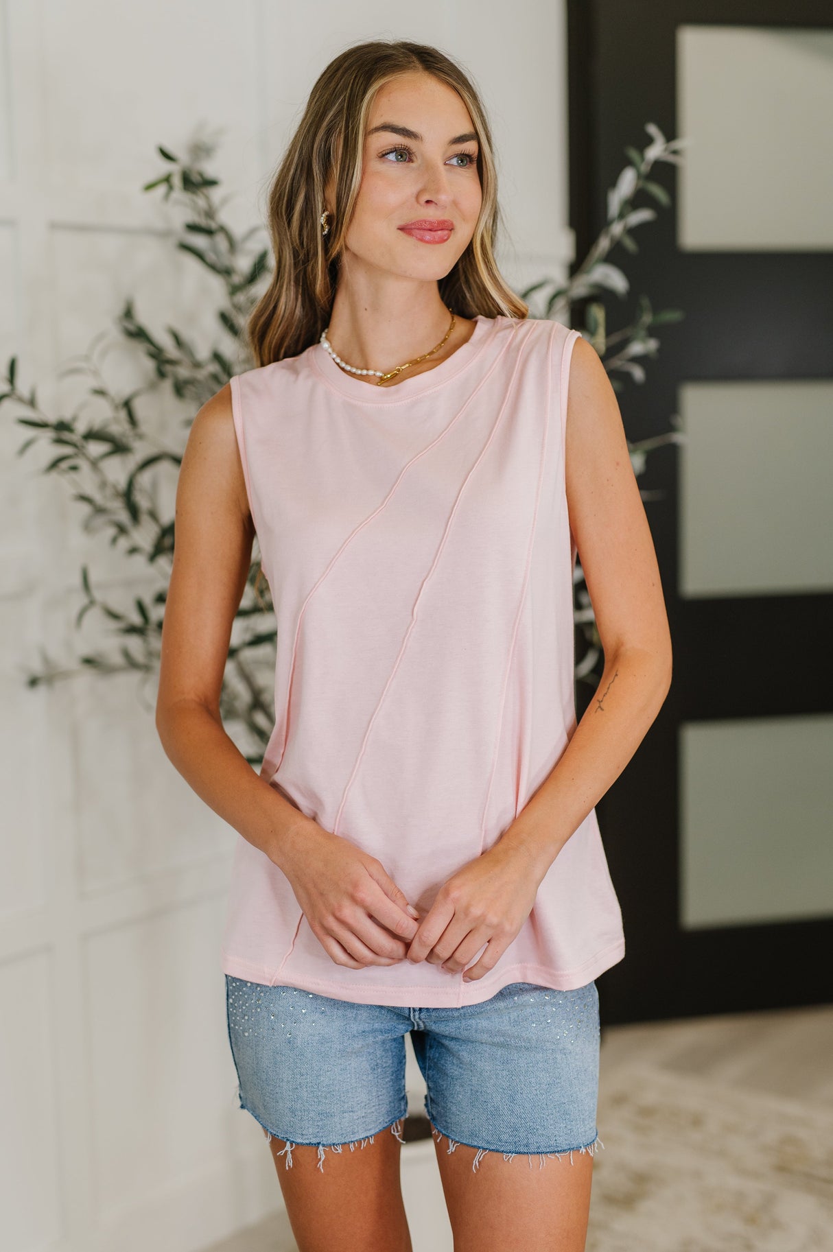 Blusa sin mangas con detalle plisado New Normal en rosa
