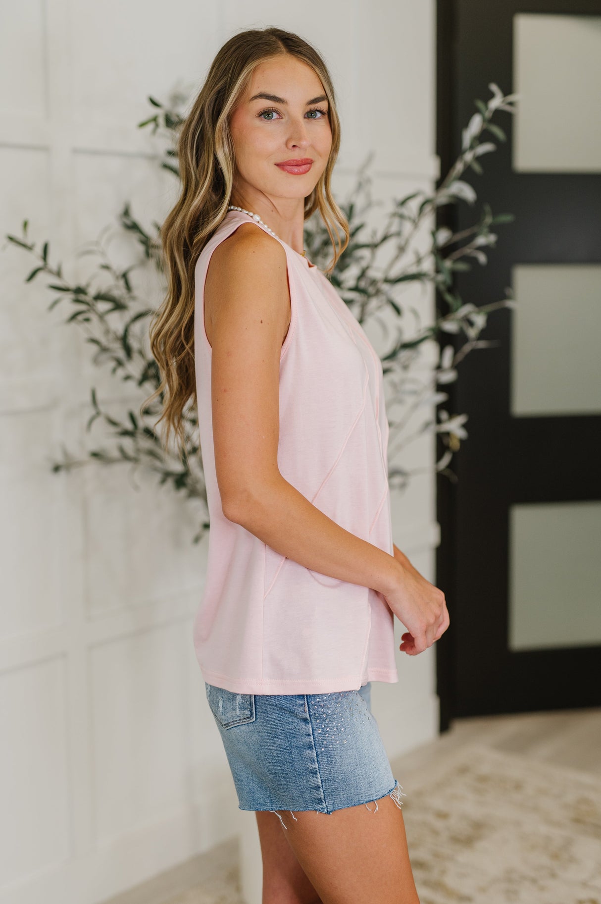 Blusa sin mangas con detalle plisado New Normal en rosa