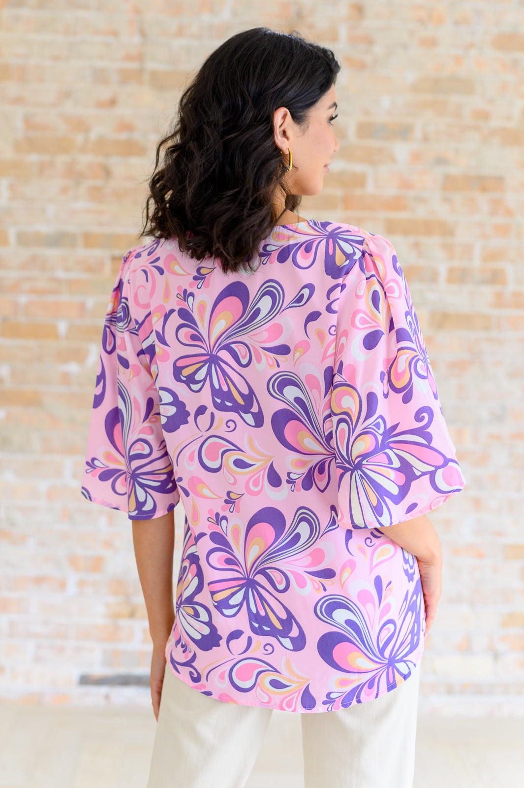 Top Tropics con cuello en V en varios tonos rubor