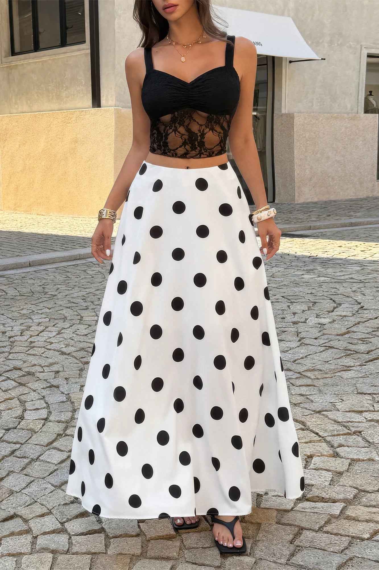Polka dot pencil skirt styled as a versatile boutique wardrobe piece