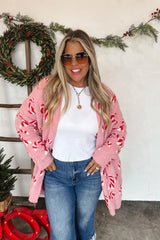 RESERVA: Cárdigan de nube navideña con bastón de caramelo