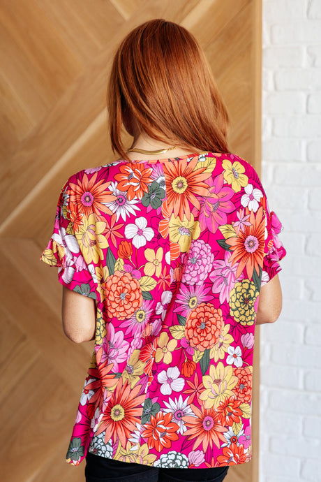 Top floral Flit About en rosa