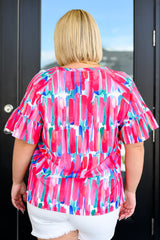 Blusa con cuello en V de exhibición de arte