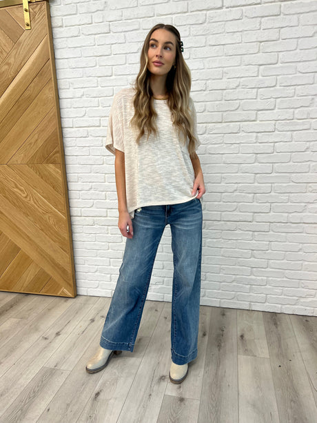 Blusa de manga dolman fluida en beige arena