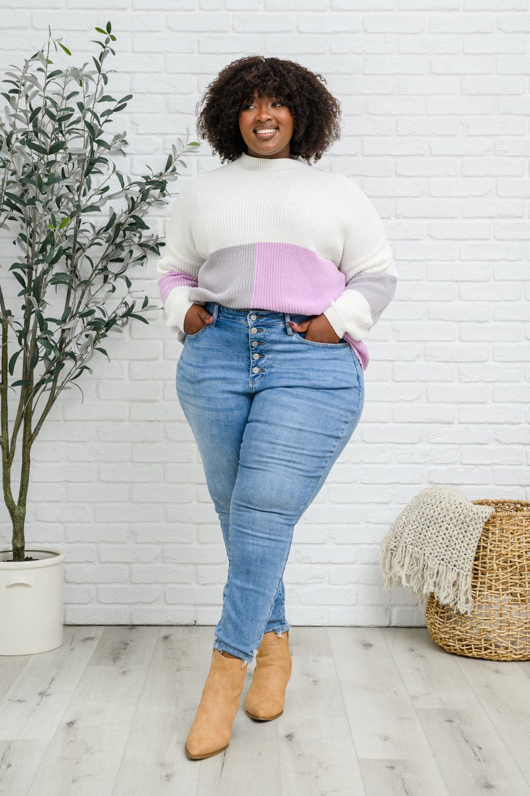 Pantalón pitillo de talle alto con bragueta de botones
