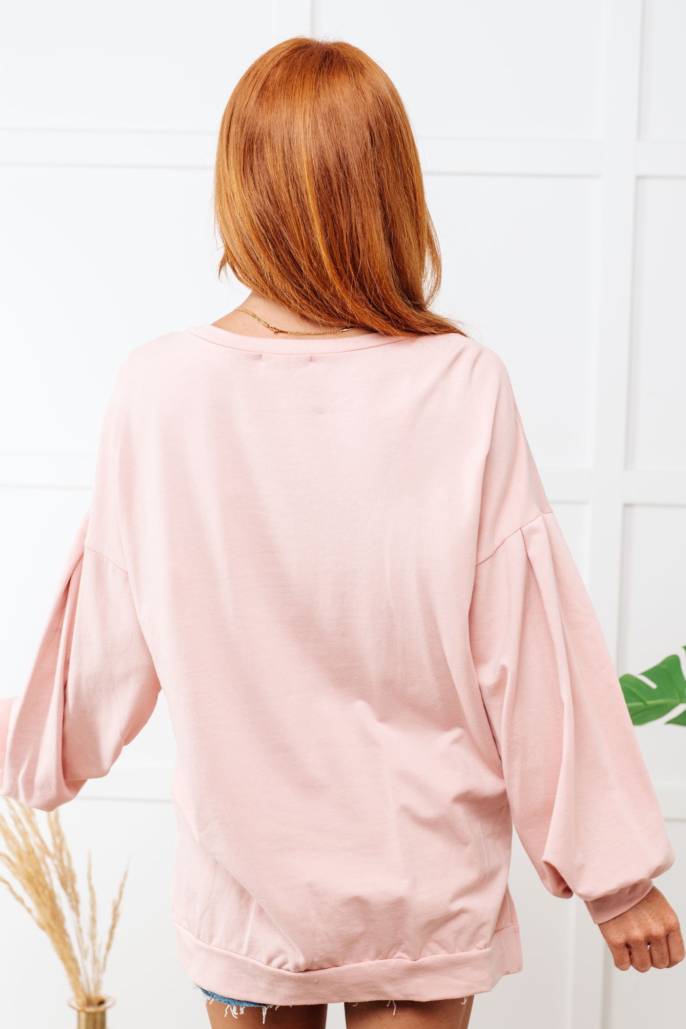 Suéter gráfico de vaquera en rosa empolvado