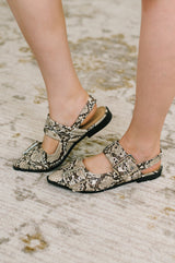 Crazy Train Buckle Pointy Toe Flats in Snakeskin