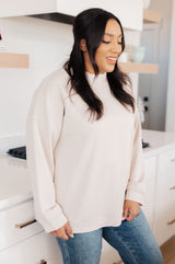 Suéter de cuello alto "No cambies nada"