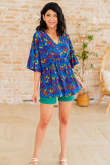 Top peplum Dreamer en azul real y rojo abstracto