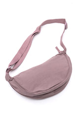 Minibolso bandolera redondo Essentially Everything en color lavanda