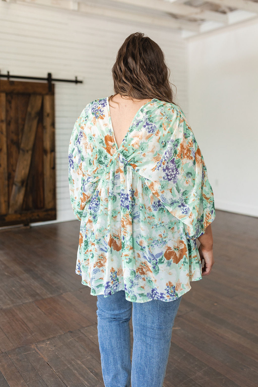 Top peplum drapeado floral Fabled en color marfil 