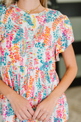 Top con mangas onduladas Flirt Alert en color marfil