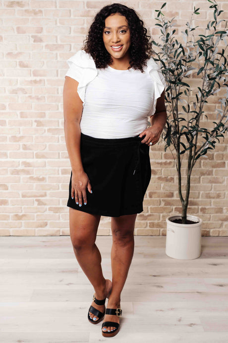 Blusa con mangas con volantes de Highest Praise