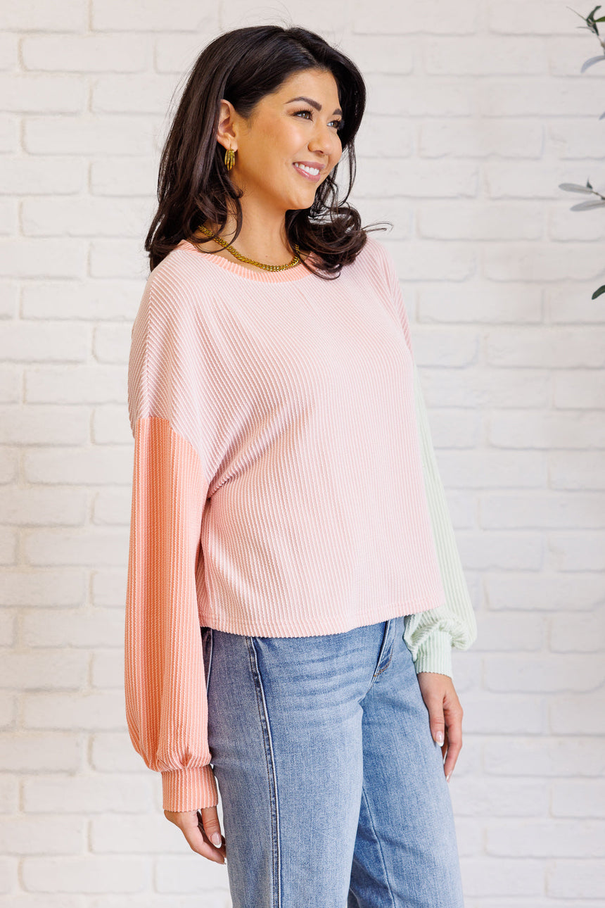 Top con bloques de color "Golpéame con tu mejor tiro" en multicolor
