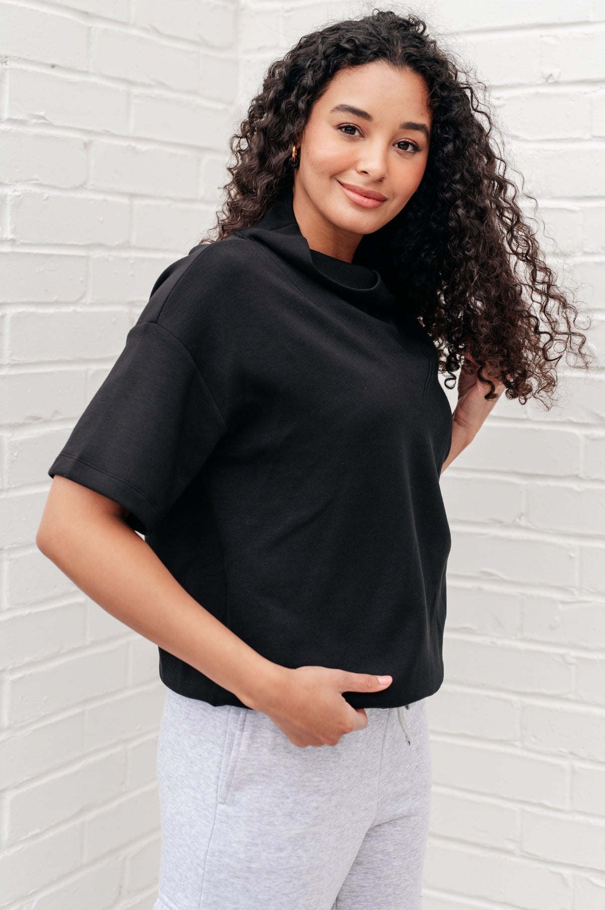 Top de cuello alto "I Just Felt Like It" en negro