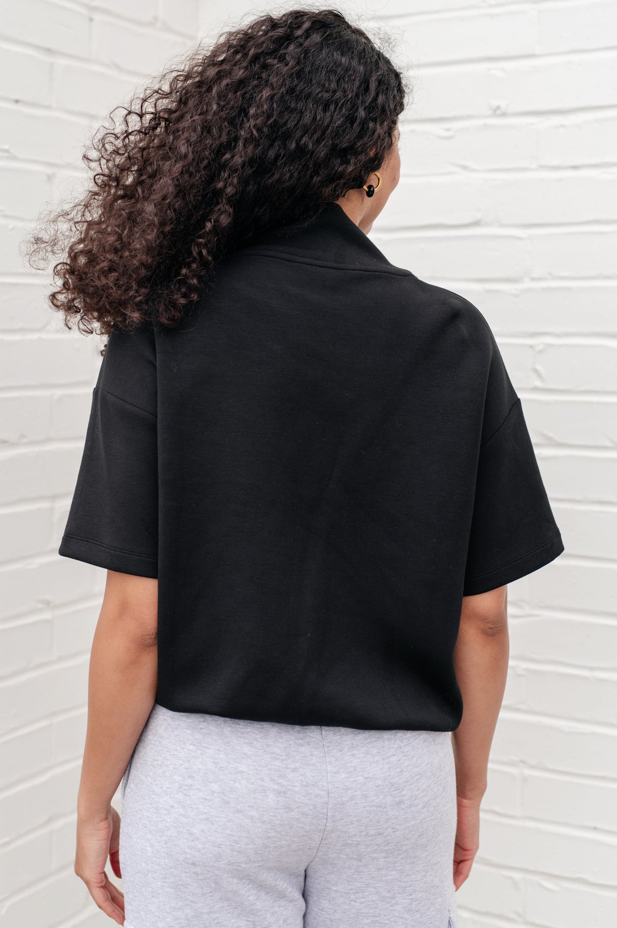 Top de cuello alto "I Just Felt Like It" en negro