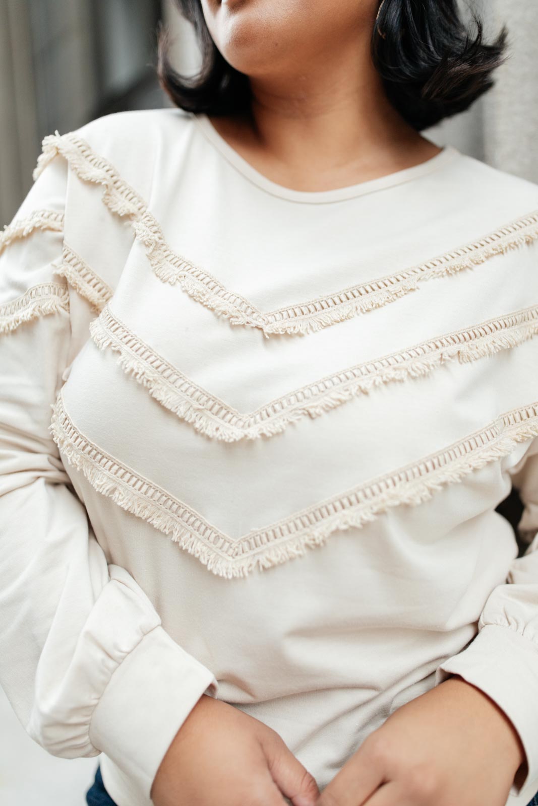 Top con flecos en beige
