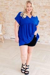 ¿No es ese un vestido con cuello en V tan bonito?