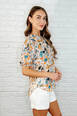 Blusa floral intuitiva