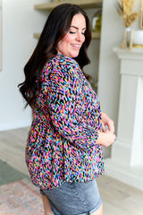 Top Babydoll Lizzy en negro con múltiples detalles pintados