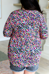 Top Babydoll Lizzy en negro con múltiples detalles pintados