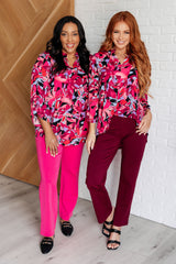 Top Lizzy con estampado floral negro y magenta