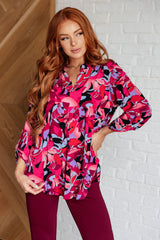 Top Lizzy con estampado floral negro y magenta