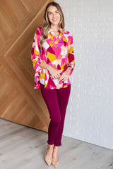 Pantalones pitillo tobilleros Magic en color vino