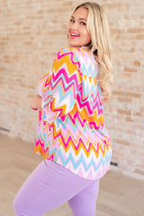 Lizzy Top in Orange Multi Chevron - Liarian Unlimited Boutique