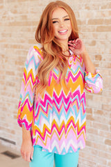 Lizzy Top in Orange Multi Chevron - Liarian Unlimited Boutique