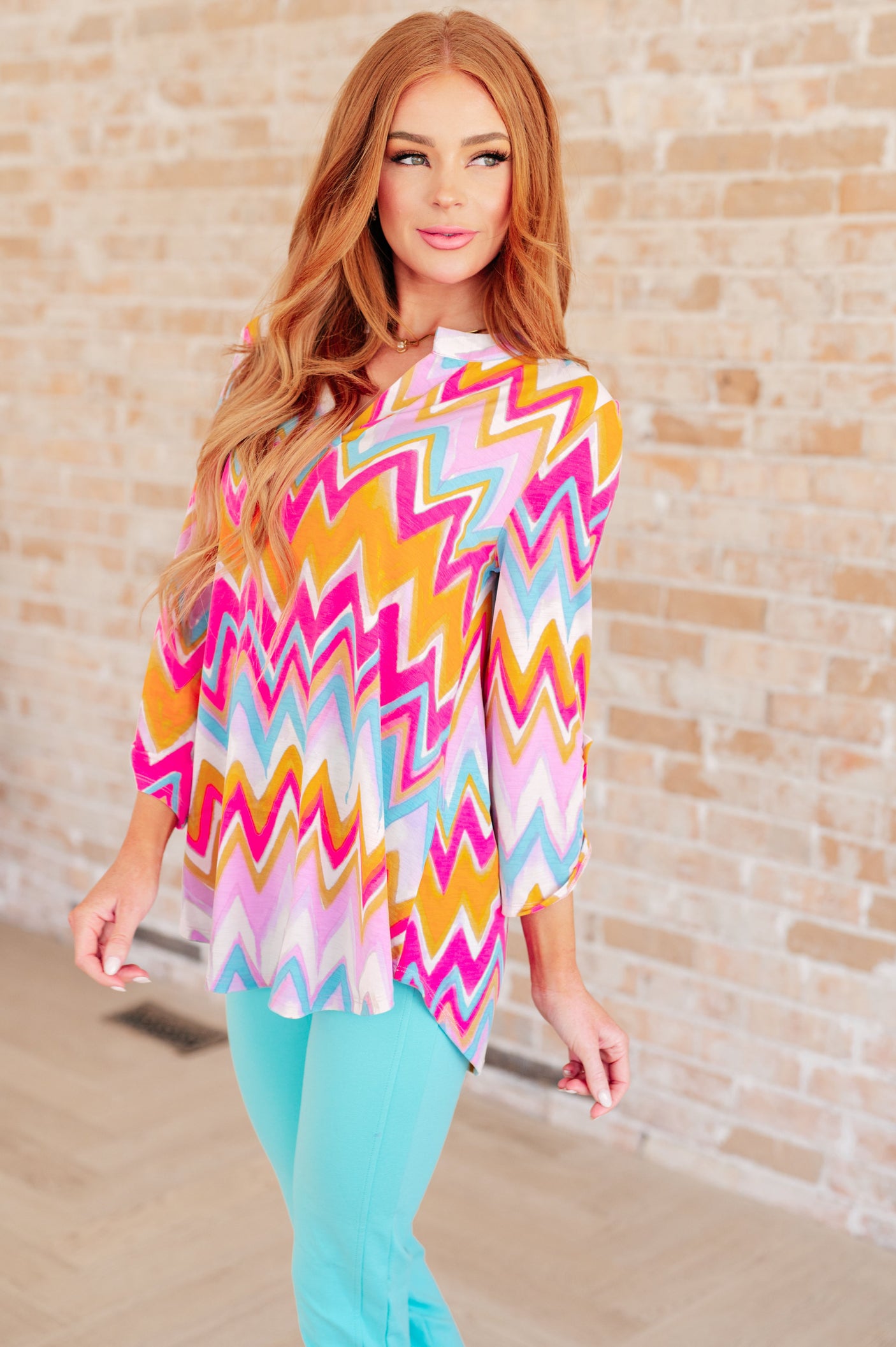Lizzy Top in Orange Multi Chevron - Liarian Unlimited Boutique