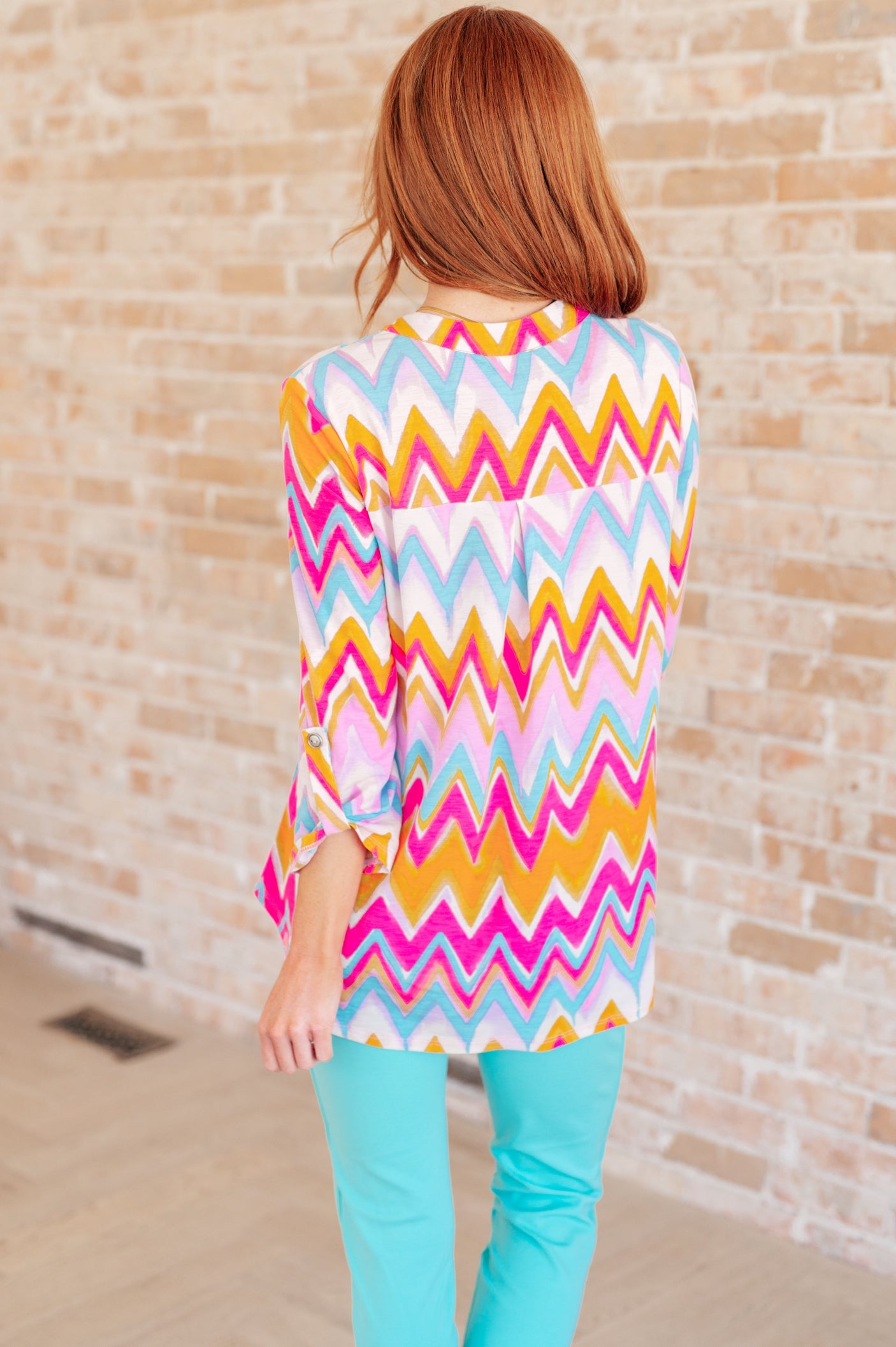 Lizzy Top in Orange Multi Chevron - Liarian Unlimited Boutique
