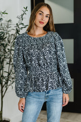Blusa peplum de cuello alto Muse Moves en negro