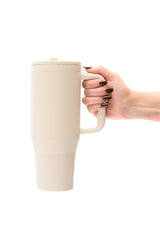 Vaso antiderrames de 40 oz en color blanco roto