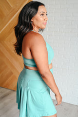 Tanque con tirantes finos y paquete asegurado en Tidal Wave