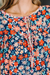 Vestido con mangas onduladas Petal to the Metal en azul marino y coral