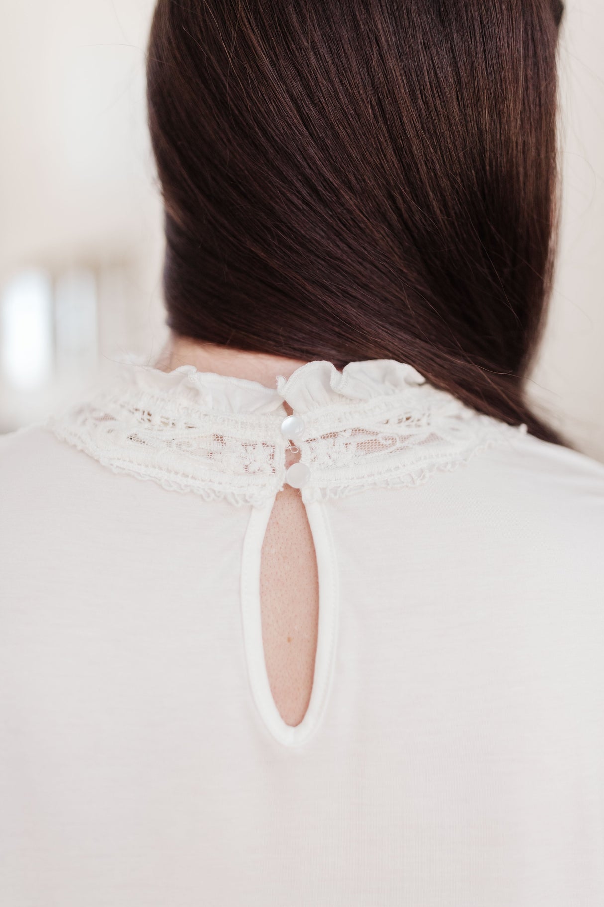 Imagina esta blusa en color blanco hueso.