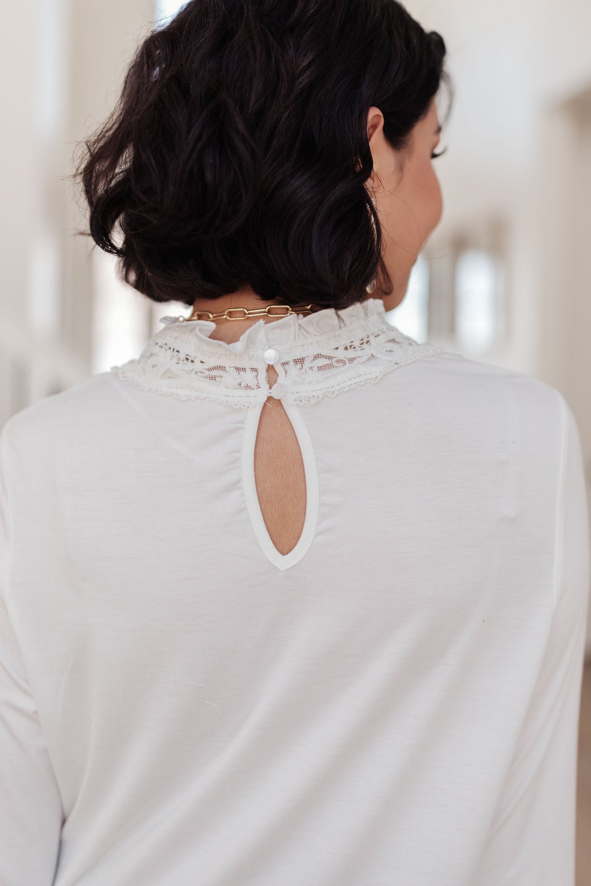 Imagina esta blusa en color blanco hueso.