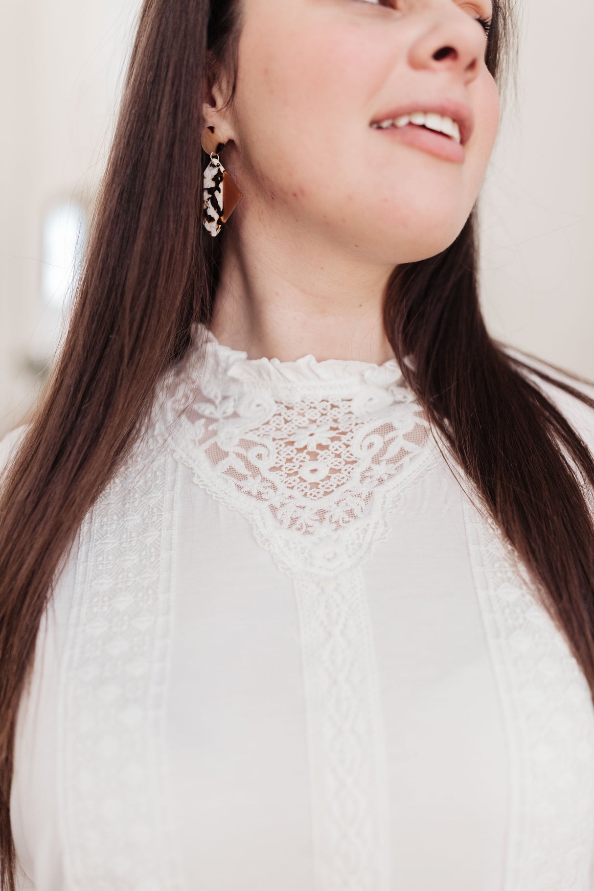 Imagina esta blusa en color blanco hueso.