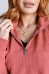 Suéter con media cremallera Quite the Impression en color óxido