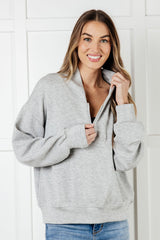 Chaqueta Rogue Runner con media cremallera en gris jaspeado