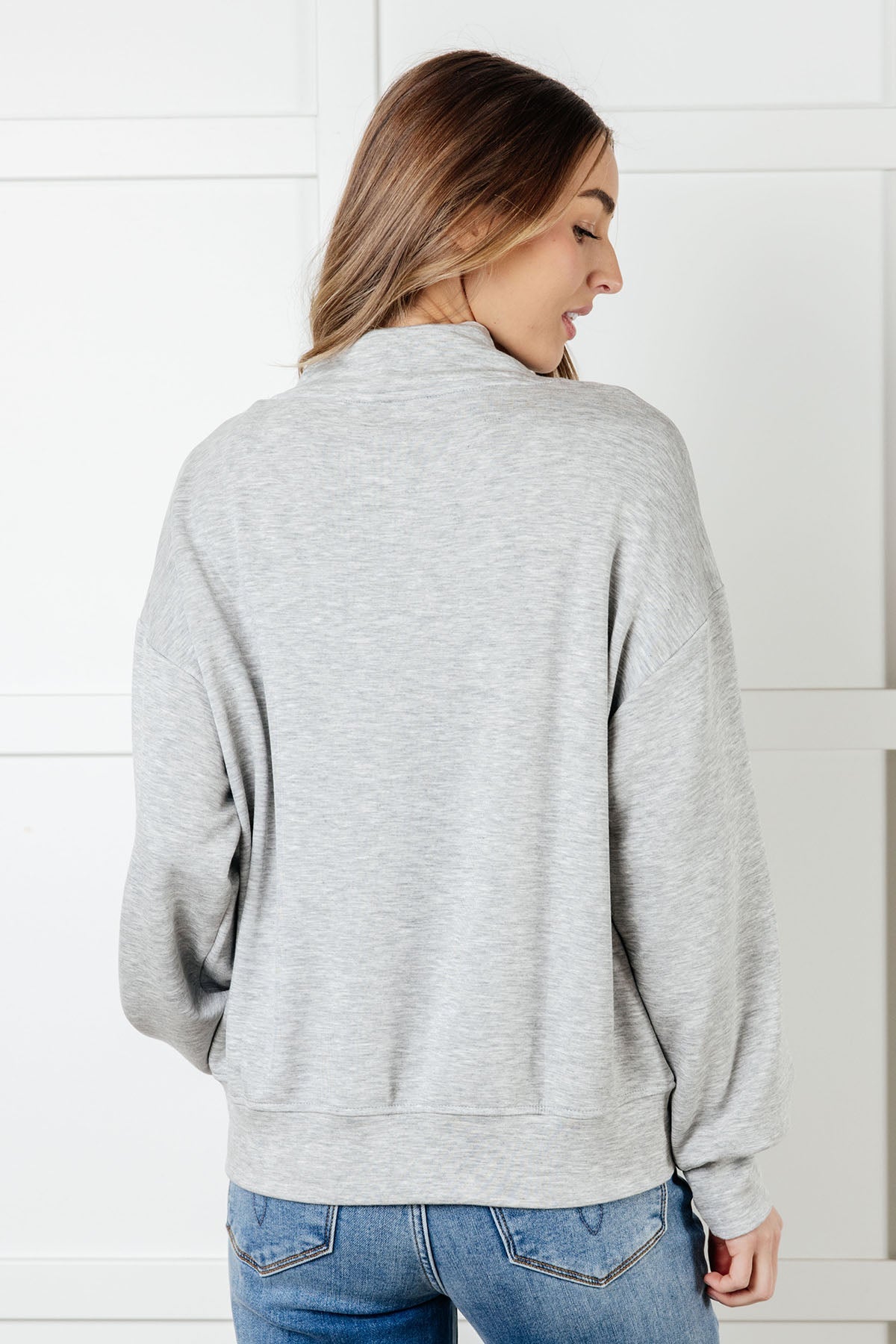 Chaqueta Rogue Runner con media cremallera en gris jaspeado
